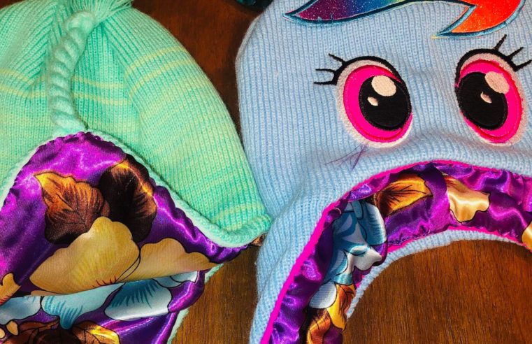 Mom adds silk-lined protection to daughter’s winter hats, and it’s genius