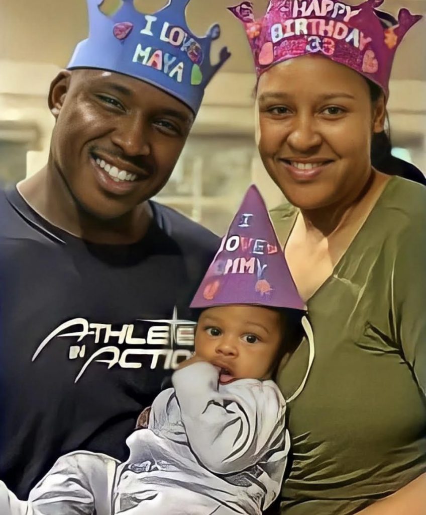 Maya Moore smiles with husband Jonathan Irons in funny birthday hats with their newborn son